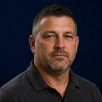 Travis Monroe